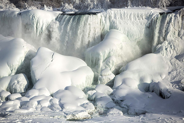 Image: A partially frozen American Falls in sub freezing temperatures is seen in Niagara Falls Ontario