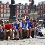 Leicester fans with a Liverpool fan in the Plaza Mayor before the match