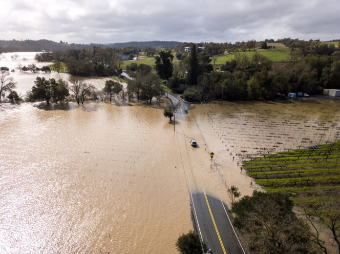 Over 12 people killed in US as California faces more severe weather and flooding.